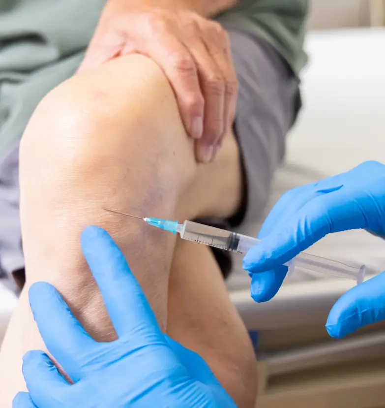 Knee injection procedure with syringe